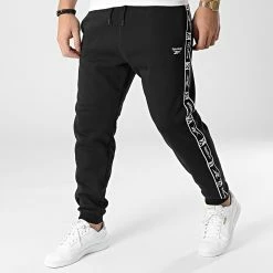 Promo 🌟 Pantalon Jogging A Bandes Reebok Identity Tape HB5978 Noir 🌟