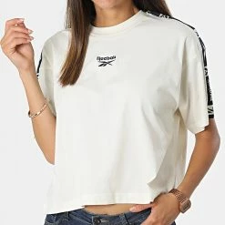 Grosses soldes 🥰 Tee 👚 Shirt Femme A Bandes HH7703 Beige de Reebok 🥰